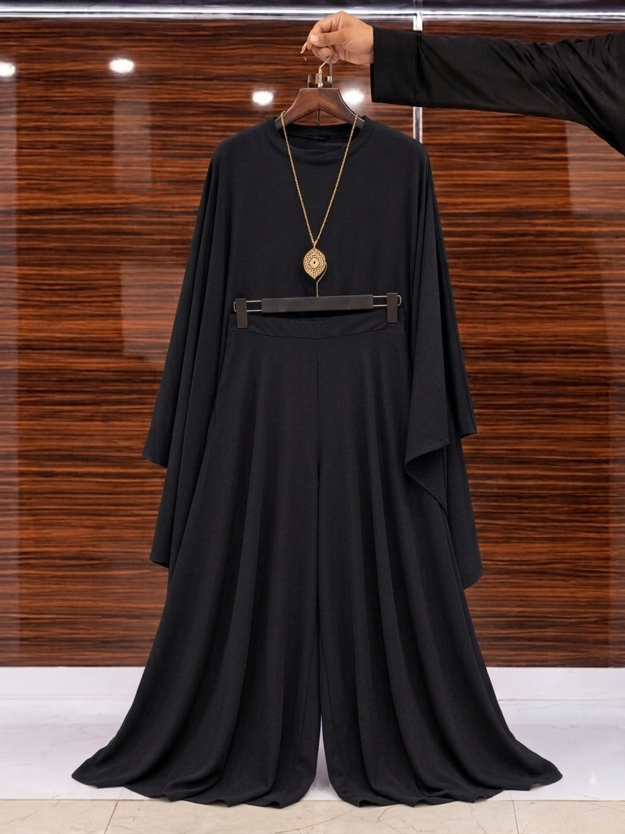Side profile view of Chakoor Royal Mocha Draped Luxe Co-Ord Set showing elegant draping and relaxed trousers