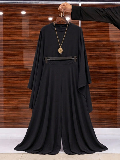 Side profile view of Chakoor Royal Mocha Draped Luxe Co-Ord Set showing elegant draping and relaxed trousers